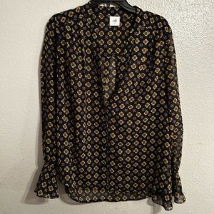 Sheer long bell sleeve, buttons up. Zoomed in on details in pictures